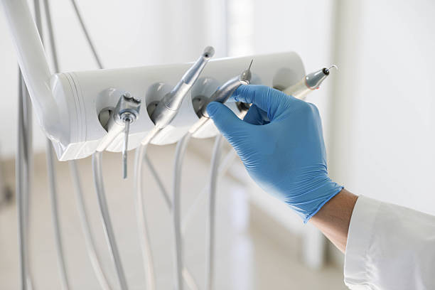 Professional Tooth Extraction technician working in Pearland, TX